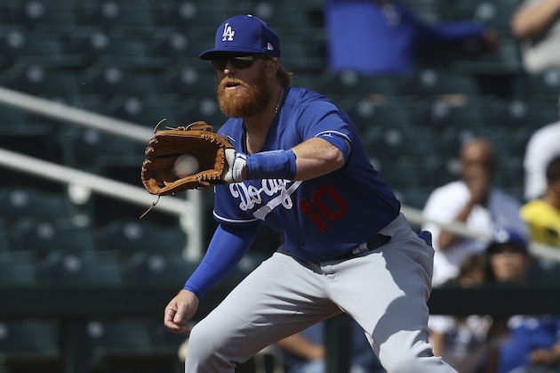 Los Angeles Dodgers third baseman Justin Turner makes a catch during the second inning of a spring training baseball game against the Cleveland Indians Thursday, Feb. 27, 2020, in Goodyear, Ariz. (AP Photo/Ross D. Franklin) Los Angeles Dodgers third baseman Justin Turner makes a catch during the second inning of a spring training baseball game against the Cleveland Indians Thursday, Feb. 27, 2020, in Goodyear, Ariz. (AP Photo/Ross D. Franklin)