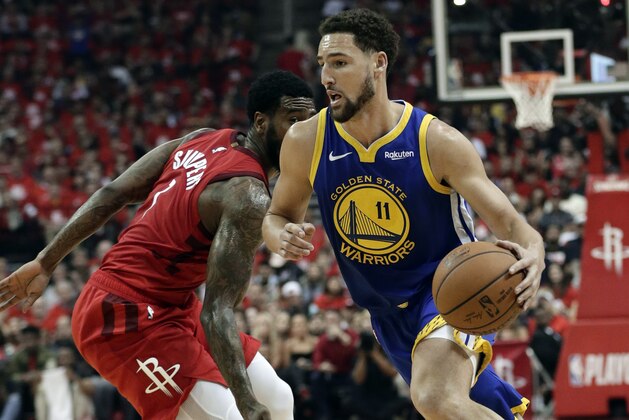 Golden State Warriors' Klay Thompson (11) drives past Houston Rockets' Iman Shumpert during the first half of Game 6 of a second-round NBA basketball playoff series Friday, May 10, 2019, in Houston. (AP Photo/Eric Gay) Golden State Warriors' Klay Thompson (11) drives past Houston Rockets' Iman Shumpert during the first half of Game 6 of a second-round NBA basketball playoff series Friday, May 10, 2019, in Houston. (AP Photo/Eric Gay)