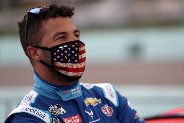 HOMESTEAD, FLORIDA - JUNE 14: Bubba Wallace, driver of the #43 World Wide Technology Chevrolet, stands on the grid prior to the NASCAR Cup Series Dixie Vodka 400 at Homestead-Miami Speedway on June 14, 2020 in Homestead, Florida. (Photo by Chris Graythen/Getty Images)