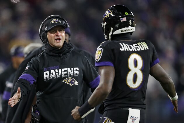 BALTIMORE, MD - DECEMBER 12: Head coach John Harbaugh of the Baltimore Ravens celebrates with Lamar Jackson #8 after a scoring play against the New York Jets during the second half at M&T Bank Stadium on December 12, 2019 in Baltimore, Maryland. (Photo by Scott Taetsch/Getty Images)