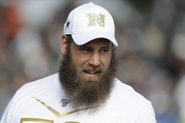 In this Jan. 22, 2020, photo, NFC center Travis Frederick, of the Dallas Cowboys, appears during a practice for the NFL Pro Bowl football game in Kissimmee, Fla. Frederick is retiring from the NFL at 29. The surprising decision comes less than two years after Frederick was diagnosed with a neurological disorder that sidelined him for all of 2018. (AP Photo/Chris O'Meara)