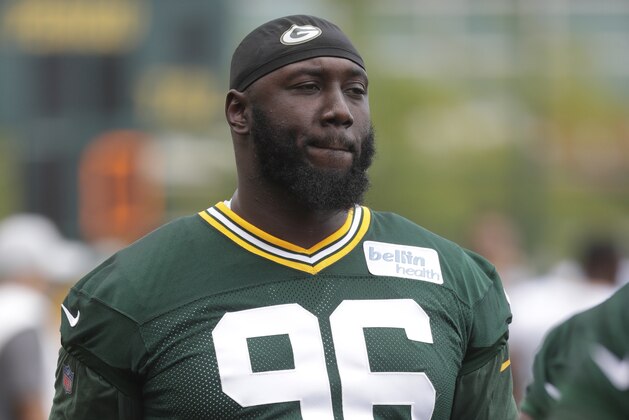 FILE - In this Thursday, July 26, 2018, file photo, Green Bay Packers' Muhammad Wilkerson warms up during NFL football training camp in Green Bay, Wis. Former New York Jets defensive end Wilkerson is charged with driving while intoxicated after his arrest in New York City. A police spokesman says Wilkerson was arraigned Saturday, June 1, 2019,  in Manhattan Criminal Court and released on his own recognizance. (AP Photo/Morry Gash, File)