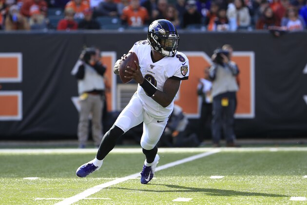 CINCINNATI, OHIO - NOVEMBER 10:  Lamar Jackson #8 of the Baltimore Ravens runs with the ball during the game against the Cincinnati Bengals at Paul Brown Stadium on November 10, 2019 in Cincinnati, Ohio. (Photo by Andy Lyons/Getty Images)