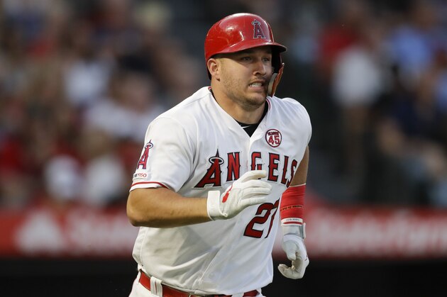 Los Angeles Angels' Mike Trout runs to first during a baseball game against the Boston Red Sox in Anaheim, Calif., Saturday, Aug. 31, 2019. (AP Photo/Chris Carlson)