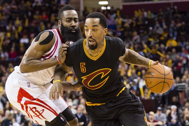 CLEVELAND, OH - MARCH 29: James Harden #13 of the Houston Rockets puts pressure on J.R. Smith #5 of the Cleveland Cavaliers during the second half at Quicken Loans Arena on March 29, 2016 in Cleveland, Ohio. The Rockets defeated the Cavaliers 106-100. NOTE TO USER: User expressly acknowledges and agrees that, by downloading and/or using this photograph, user is consenting to the terms and conditions of the Getty Images License Agreement. Mandatory copyright notice. (Photo by Jason Miller/Getty Images)