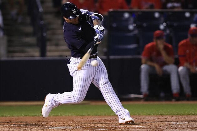 TAMPA, FL - MARCH 4: Gleyber Torres #25 of the New York Yankees singles during the first inning of a spring training game against the Philadelphia Phillies at Steinbrenner Field on March 4, 2020 in Tampa, Florida. (Photo by Carmen Mandato/Getty Images)