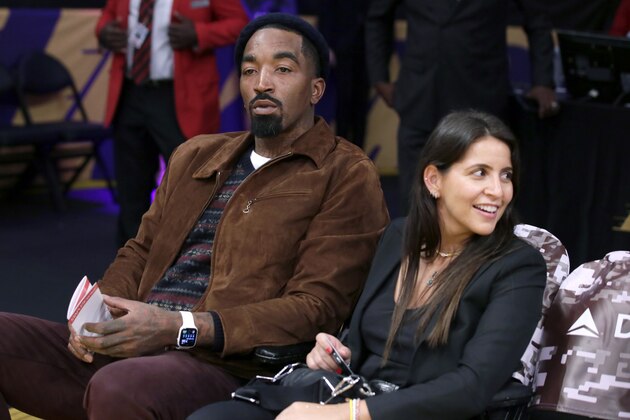 Former NBA basketball player J.R. Smith watches warm ups before an NBA basketball game between the Los Angeles Lakers and the Sacramento Kings in Los Angeles, Friday, Nov. 15, 2019. (AP Photo/Alex Gallardo)