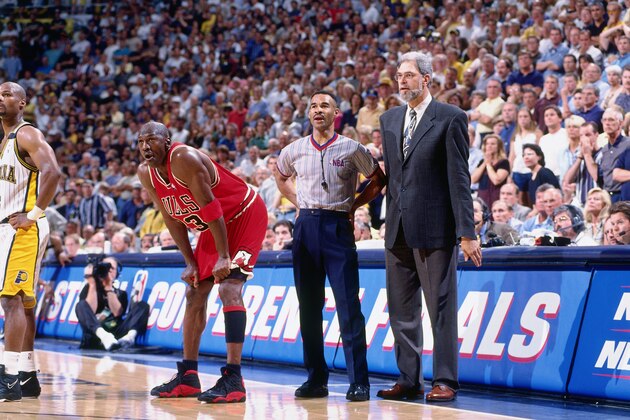 INDIANAPOLIS - MAY 29:  Michael Jordan #23 of the Chicago Bulls and coach Phil Jackson of the Chicago Bulls look on during a game played on May 29, 1998 at the Market Square Arena in Indianapolis, Indiana.  NOTE TO USER: User expressly acknowledges and agrees that, by downloading and or using this photograph, User is consenting to the terms and conditions of the Getty Images License Agreement. Mandatory Copyright Notice: Copyright 1998 NBAE  (Photo by Nathaniel S. Butler/NBAE via Getty Images)