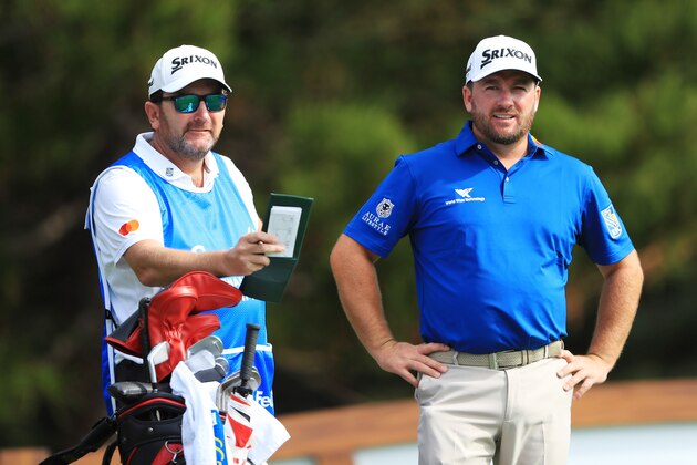 KAPALUA, HAWAII - JANUARY 02: Graeme McDowell of Northern Ireland and caddie Ken Comboy look on from the second tee during the first round of the Sentry Tournament Of Champions at the Kapalua Plantation Course on January 02, 2020 in Kapalua, Hawaii. (Photo by Sam Greenwood/Getty Images)