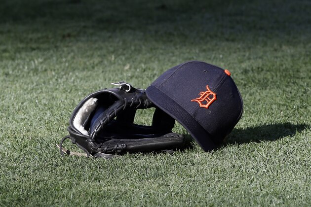 Detroit Tigers hat and glove waits for a player during warm ups before a baseball game against the Los Angeles Angels in Anaheim, Calif., Friday, May 12, 2017. (AP Photo/Alex Gallardo)