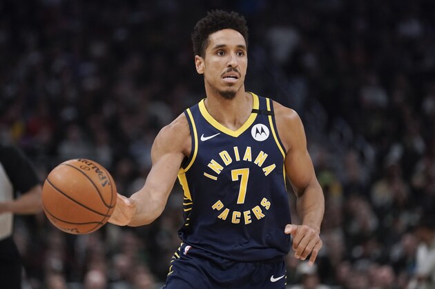 Indiana Pacers' Malcolm Brogdon dribbles during the second half of an NBA basketball game against the Milwaukee Bucks Wednesday, March 4, 2020, in Milwaukee. The Bucks won 119-100. (AP Photo/Morry Gash)