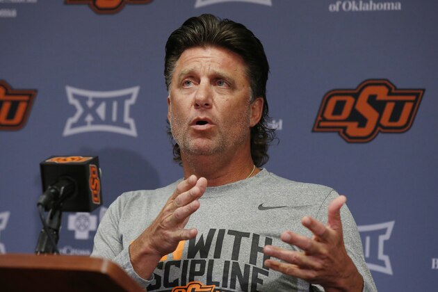 Oklahoma State coach Mike Gundy answers a question during the NCAA college football team's media day in Stillwater Okla., Saturday, Aug. 3, 2019. (AP Photo/Sue Ogrocki) Oklahoma State coach Mike Gundy answers a question during the NCAA college football team's media day in Stillwater Okla., Saturday, Aug. 3, 2019. (AP Photo/Sue Ogrocki)
