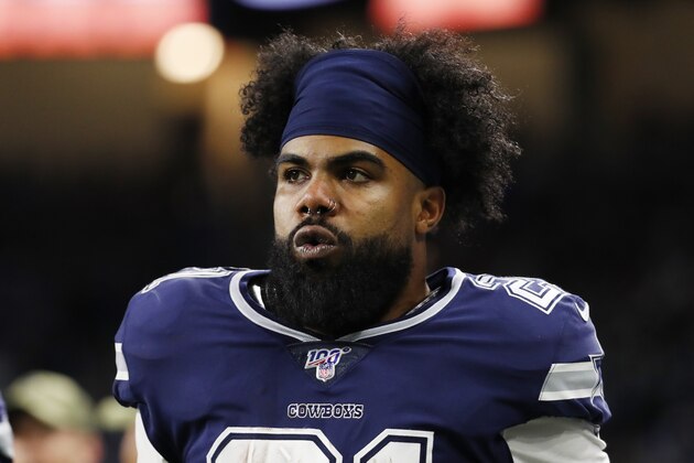Dallas Cowboys running back Ezekiel Elliott (21) walks in the bench area during the second half of an NFL football game against the Detroit Lions, Sunday, Nov. 17, 2019, in Detroit. (AP Photo/Paul Sancya)