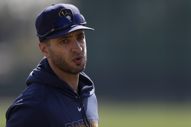 Milwaukee Brewers' Ryan Braun looks on during spring training baseball Wednesday, Feb. 19, 2020, in Phoenix. (AP Photo/Gregory Bull)