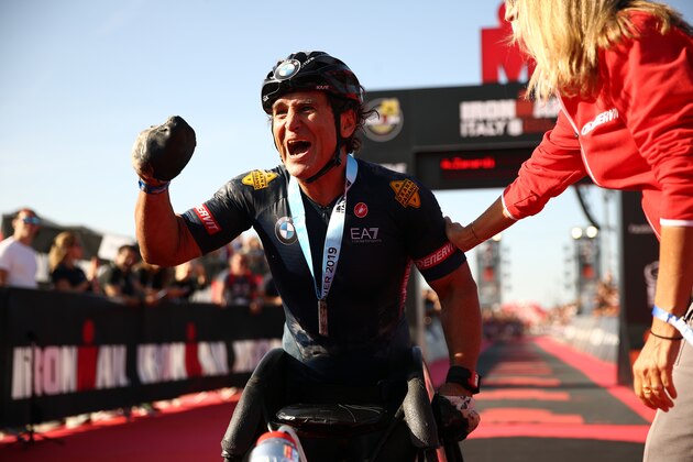 CERVIA, ITALY - SEPTEMBER 21: Alex Zanardi of Italy celebrates finishing  IRONMAN Italy on September 21, 2019 in Cervia, Italy. (Photo by Bryn Lennon/Getty Images for IRONMAN)