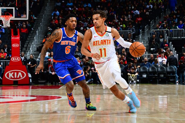 ATLANTA, GA - MARCH 11: Trae Young #11 of the Atlanta Hawks handles the ball against the New York Knicks on March 11, 2020 at State Farm Arena in Atlanta, Georgia.  NOTE TO USER: User expressly acknowledges and agrees that, by downloading and/or using this Photograph, user is consenting to the terms and conditions of the Getty Images License Agreement. Mandatory Copyright Notice: Copyright 2020 NBAE (Photo by Scott Cunningham/NBAE via Getty Images)