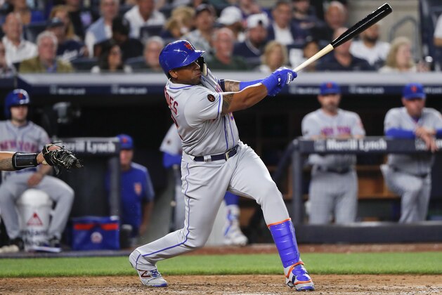 New York Mets' Yoenis Cespedes connects for a base hit against the New York Yankees during the sixth inning of a baseball game, Friday, July 20, 2018, in New York. (AP Photo/Julie Jacobson)