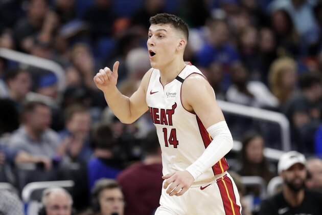Miami Heat guard Tyler Herro reacts after sinking a 3-point shot against the Orlando Magic during the second half of an NBA basketball game, Saturday, Feb. 1, 2020, in Orlando, Fla. (AP Photo/John Raoux)