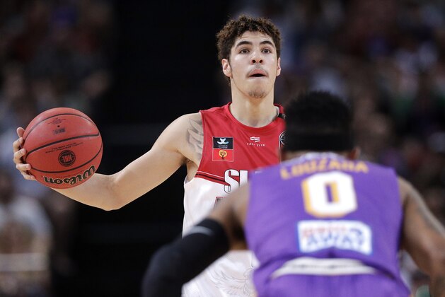 LaMelo Ball of the Illawarra Hawks carries the ball up during their game against the Sydney Kings in the Australian Basketball League in Sydney, Sunday, Nov. 17, 2019. (AP Photo/Rick Rycroft)