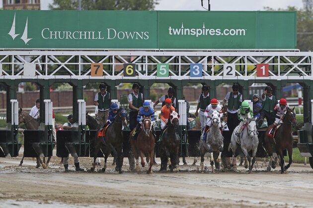 Horses break from the starting gate at Churchill Downs Thursday, May 2, 2019, in Louisville, Ky. The 145th running of the Kentucky Derby is scheduled for Saturday, May 4. (AP Photo/Gregory Payan)