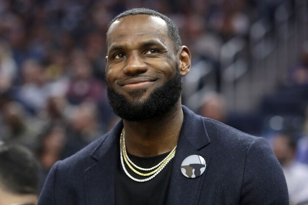FILE - In this Feb. 27, 2020 file photo, Los Angeles Lakers forward LeBron James appears during an NBA basketball game against the Golden State Warriors in San Francisco. Though the coronavirus pandemic has upended graduation season, James is putting together an all-star event to honor and celebrate the Class of 2020. The one-hour special,