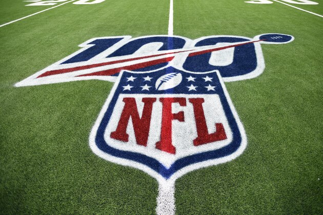 The 100th anniversary logo is shown above the NFL shield before an NFL wild-card playoff football game between the Buffalo Bills and Houston Texans Saturday, Jan. 4, 2020, in Houston. (AP Photo/Eric Christian Smith)