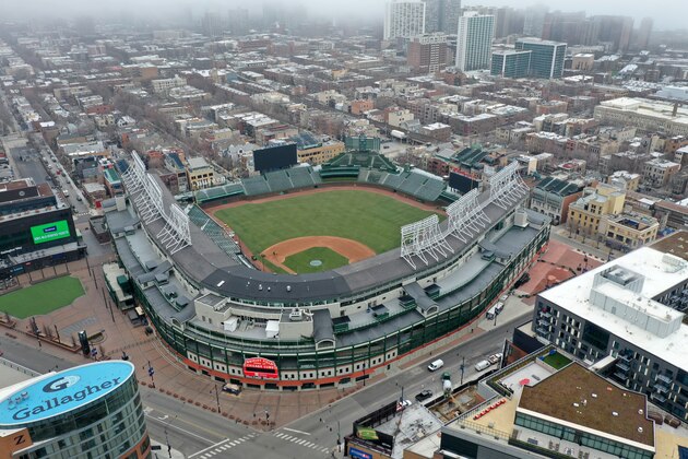 CHICAGO, ILLINOIS - MARCH 26: An aerial from a drone shows Wrigley Field, home of the Chicago Cubs, which, like all Major League Baseball (MLB) parks sits nearly empty on what was to be opening day for MLB on March 26, 2020 in Chicago, Illinois. Major League Baseball has postponed the start of its season indefinitely due to the coronavirus (COVID-19) outbreak.  (Photo by Scott Olson/Getty Images)