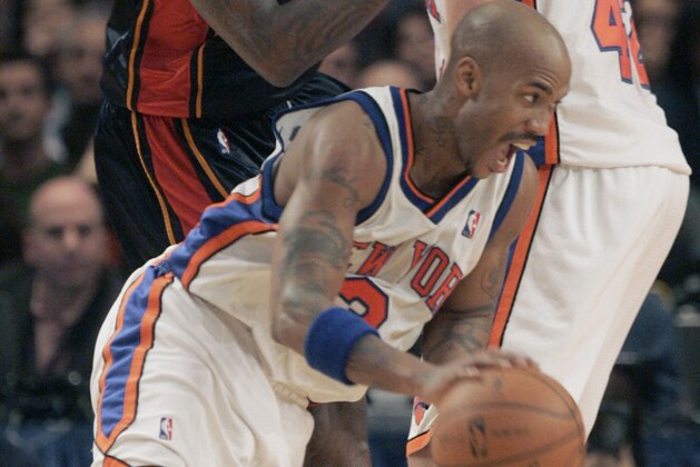 New York Knicks forward David Lee (42) sets a pick as teammate Stephon Marbury (3) drives past Golden State Warriors forward Stephen Jackson (1) during second half basketball action Tuesday, Nov. 20, 2007 at Madison Square Garden in New York. The Knicks lost the game 108-82.(AP Photo/Frank Franklin II) New York Knicks forward David Lee (42) sets a pick as teammate Stephon Marbury (3) drives past Golden State Warriors forward Stephen Jackson (1) during second half basketball action Tuesday, Nov. 20, 2007 at Madison Square Garden in New York. The Knicks lost the game 108-82.(AP Photo/Frank Franklin II)