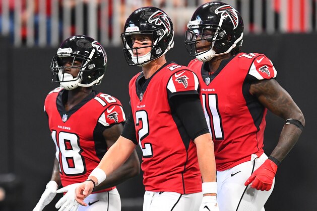 ATLANTA, GA - SEPTEMBER 23: Calvin Ridley #18, Matt Ryan #2, and Julio Jones #11 of the Atlanta Falcons take the field during the second quarter against the New Orleans Saints at Mercedes-Benz Stadium on September 23, 2018 in Atlanta, Georgia. (Photo by Scott Cunningham/Getty Images)