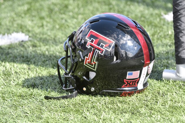 LAWRENCE, KS - OCTOBER 7: A Texas Tech Red Raiders helmet rest on the field during a game against the Kansas Jayhawks at Memorial Stadium on October 7, 2017 in Lawrence, Kansas. (Photo by Ed Zurga/Getty Images) *** Local Caption ***