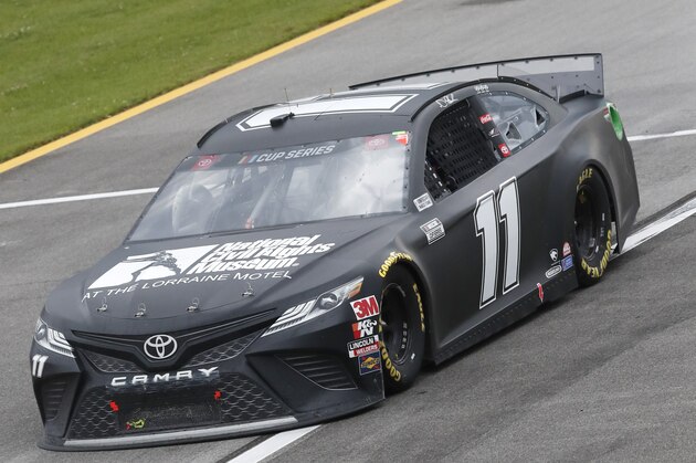 Denny Hamlin (11) heads to the pits during the NASCAR Cup Series auto race at the Talladega Superspeedway in Talladega Ala., Monday, June 22, 2020. (AP Photo/John Bazemore) Denny Hamlin (11) heads to the pits during the NASCAR Cup Series auto race at the Talladega Superspeedway in Talladega Ala., Monday, June 22, 2020. (AP Photo/John Bazemore)