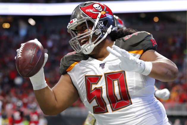 ATLANTA, GA - NOVEMBER 24: Vita Vea #50 of the Tampa Bay Buccaneers celebrate a touchdown reception in the first half of an NFL game against the Atlanta Falcons at Mercedes-Benz Stadium on November 24, 2019 in Atlanta, Georgia. (Photo by Todd Kirkland/Getty Images) ATLANTA, GA - NOVEMBER 24: Vita Vea #50 of the Tampa Bay Buccaneers celebrate a touchdown reception in the first half of an NFL game against the Atlanta Falcons at Mercedes-Benz Stadium on November 24, 2019 in Atlanta, Georgia. (Photo by Todd Kirkland/Getty Images)