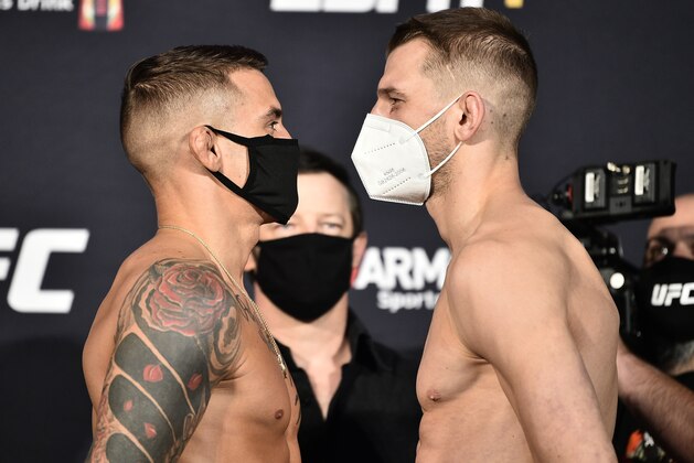 LAS VEGAS, NEVADA - JUNE 26: (L-R) Opponents Dustin Poirier and Dan Hooker of New Zealand face off during the UFC weigh-in at UFC APEX on June 26, 2020 in Las Vegas, Nevada. (Photo by Chris Unger/Zuffa LLC)
