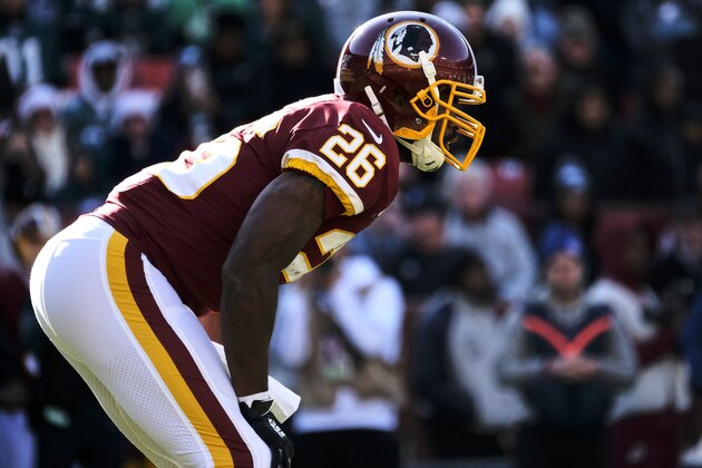 Washington Redskins running back Adrian Peterson stands in the backfield during an NFL football game against the Philadelphia Eagles, Sunday, Dec. 15, 2019, in Landover, Md. (AP Photo/Mark Tenally)