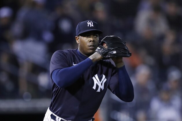 New York Yankees relief pitcher Aroldis Chapman prepares to throw during a spring training baseball game against the Baltimore Orioles, Friday, March 6, 2020, in Tampa, Fla. (AP Photo/Carlos Osorio)