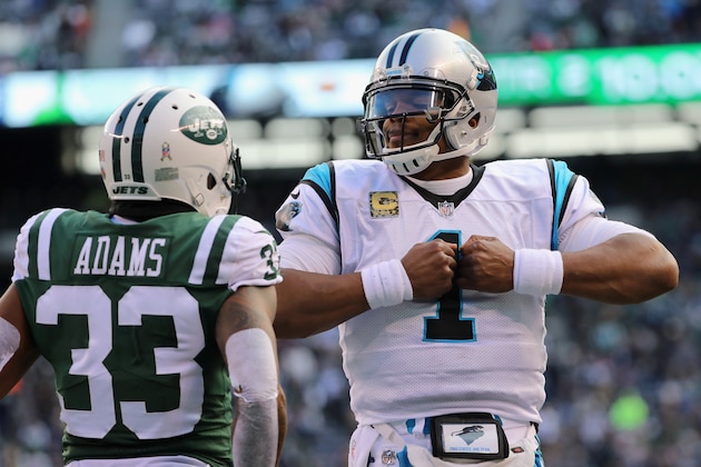 EAST RUTHERFORD, NJ - NOVEMBER 26: Quarterback Cam Newton #1 of the Carolina Panthers celebrates his touchdown against the New York Jets as strong safety Jamal Adams #33 looks on during the second quarter of the game at MetLife Stadium on November 26, 2017 in East Rutherford, New Jersey. (Photo by Abbie Parr/Getty Images) EAST RUTHERFORD, NJ - NOVEMBER 26: Quarterback Cam Newton #1 of the Carolina Panthers celebrates his touchdown against the New York Jets as strong safety Jamal Adams #33 looks on during the second quarter of the game at MetLife Stadium on November 26, 2017 in East Rutherford, New Jersey. (Photo by Abbie Parr/Getty Images)