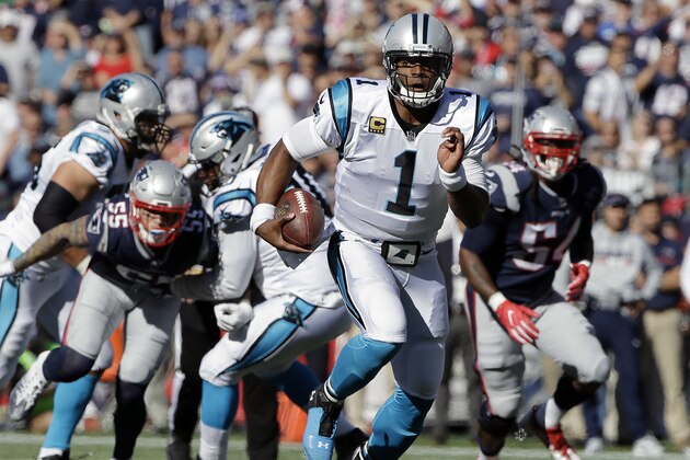 Carolina Panthers quarterback Cam Newton (1) runs for yardage during the second half of an NFL football game against the New England Patriots, Sunday, Oct. 1, 2017, in Foxborough, Mass. (AP Photo/Steven Senne)