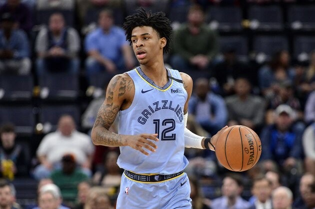 Memphis Grizzlies guard Ja Morant (12) plays in the first half of an NBA basketball game against the Orlando Magic Tuesday, March 10, 2020, in Memphis, Tenn. (AP Photo/Brandon Dill) Memphis Grizzlies guard Ja Morant (12) plays in the first half of an NBA basketball game against the Orlando Magic Tuesday, March 10, 2020, in Memphis, Tenn. (AP Photo/Brandon Dill)