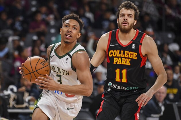 ATLANTA, GA - FEBRUARY 11: Jaylen Adams #3 of the Wisconsin Herd brings the balll past R.J. Hunter #11 of the College Park Skyhawks during the first half of an NBA G-League game on February 11, 2020 at The Gateway Center in Atlanta, GA.  NOTE TO USER: User expressly acknowledges and agrees that, by downloading and/or using this Photograph, user is consenting to the terms and conditions of the Getty Images License Agreement. Mandatory Copyright Notice: Copyright 2019 NBAE (Photo by Dale Zanine/NBAE via Getty Images)