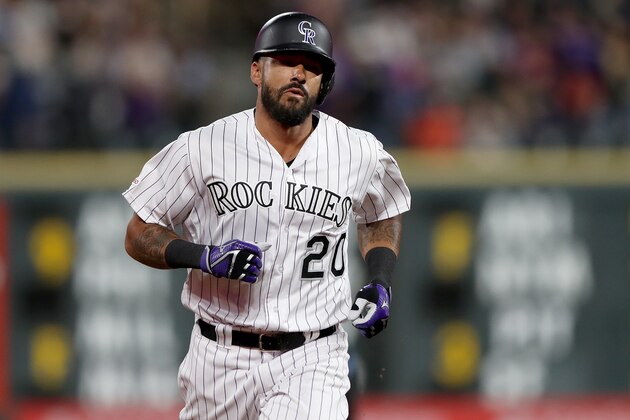 DENVER, COLORADO - SEPTEMBER 11: Ian Desmond #20 of the Colorado Rockies circles the bases after hitting a solo home run in the sixth inning against the St Louis Cardinals at Coors Field on September 11, 2019 in Denver, Colorado. (Photo by Matthew Stockman/Getty Images)
