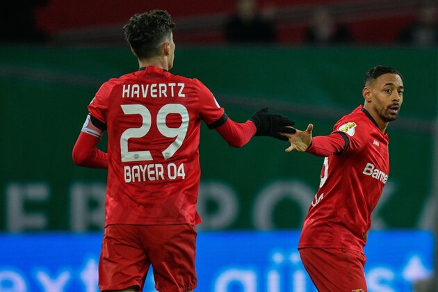 Leverkusen's German midfielder Karim Bellarabi (R) celebrate scoring the 1-1 goal with Leverkusen's German midfielder Kai Havertz during the German Cup (DFB Pokal) quarter-final football match Bayer Leverkusen v Union Berlin in Leverkusen, western Germany
on March 4, 2020. (Photo by SASCHA SCHUERMANN / AFP) / DFB REGULATIONS PROHIBIT ANY USE OF PHOTOGRAPHS AS IMAGE SEQUENCES AND QUASI-VIDEO. (Photo by SASCHA SCHUERMANN/AFP via Getty Images)