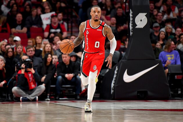 PORTLAND, OREGON - MARCH 10: Damian Lillard #0 of the Portland Trail Blazers brings the ball down the court during the second half of the game against the Phoenix Suns at the Moda Center on March 10, 2020 in Portland, Oregon. The Portland Trail Blazers topped the Phoenix Suns, 121-105. NOTE TO USER: User expressly acknowledges and agrees that, by downloading and or using this photograph, User is consenting to the terms and conditions of the Getty Images License Agreement. (Photo by Alika Jenner/Getty Images)