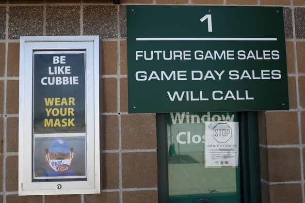 A closed ticket window sits outside Principal Park, home to the Triple-A minor league baseball Iowa Cubs, Thursday, June, 25, 2020, in Des Moines, Iowa. Two high school baseball games scheduled for Thursday at the stadium were postponed after officials said a ballpark staff member tested positive for coronavirus. (AP Photo/Charlie Neibergall) A closed ticket window sits outside Principal Park, home to the Triple-A minor league baseball Iowa Cubs, Thursday, June, 25, 2020, in Des Moines, Iowa. Two high school baseball games scheduled for Thursday at the stadium were postponed after officials said a ballpark staff member tested positive for coronavirus. (AP Photo/Charlie Neibergall)