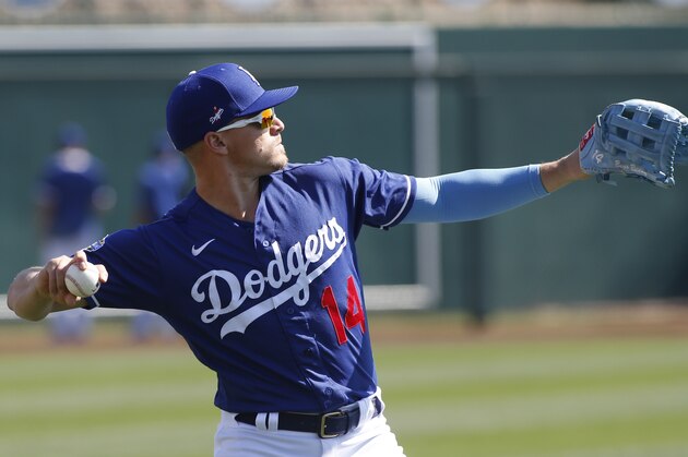 GLENDALE, ARIZONA - FEBRUARY 24:  Kike Hernandez #14 of the Los Angeles Dodgers throws to warm up prior to a Cactus League spring training game against the Chicago White Sox at Camelback Ranch on February 24, 2020 in Glendale, Arizona. (Photo by Ralph Freso/Getty Images)