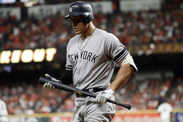 New York Yankees' Aaron Judge walks to the dugout after striking out against the Houston Astros during the fourth inning in Game 1 of baseball's American League Championship Series Saturday, Oct. 12, 2019, in Houston. (AP Photo/Eric Gay)
