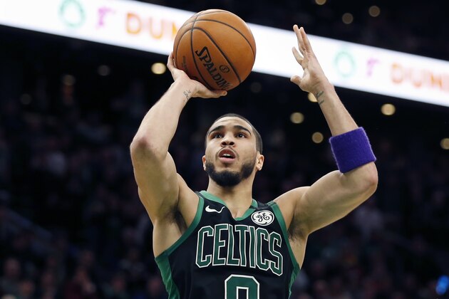 Boston Celtics' Jayson Tatum plays against the Houston Rockets in overtime during an NBA basketball game in Boston, Saturday, Feb. 29, 2020. (AP Photo/Michael Dwyer) Boston Celtics' Jayson Tatum plays against the Houston Rockets in overtime during an NBA basketball game in Boston, Saturday, Feb. 29, 2020. (AP Photo/Michael Dwyer)