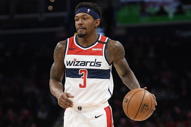Washington Wizards guard Bradley Beal (3) dribbles the ball during the second half of an NBA basketball game against the Miami Heat, Sunday, March 8, 2020, in Washington. The Heat won 100-89. (AP Photo/Nick Wass)