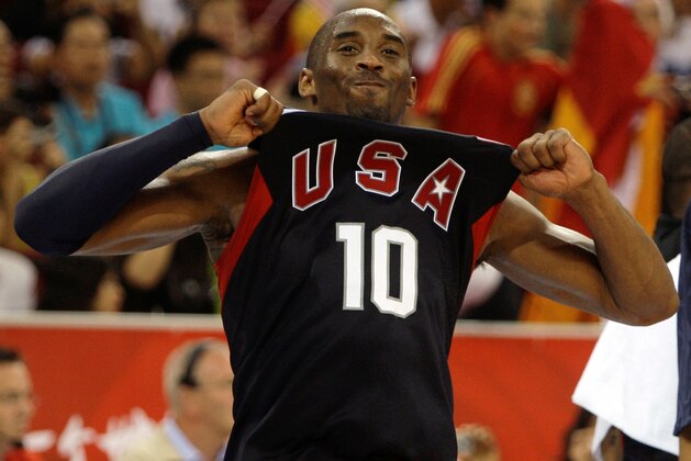 FILE - Team USA's Kobe Bryant pops his shirt as he celebrates after beating Spain, 118-107, in the men's gold medal basketball game at the Beijing 2008 Olympics in Beijing. All it took was finally getting the world's best player in uniform. someone so good deserves to be considered among the candidates for The Associated Press' Athlete of the Decade. (AP Photo/Dusan Vranic, File)