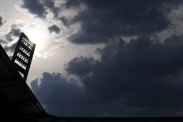 A view of the sun behind the stadium floodlights ahead ofthe German first division Bundesliga football match SV Werder Bremen v Eintracht Frankfurt on June 3, 2020 in Bremen, northern Germany. (Photo by Stuart FRANKLIN / POOL / AFP) / DFL REGULATIONS PROHIBIT ANY USE OF PHOTOGRAPHS AS IMAGE SEQUENCES AND/OR QUASI-VIDEO (Photo by STUART FRANKLIN/POOL/AFP via Getty Images)