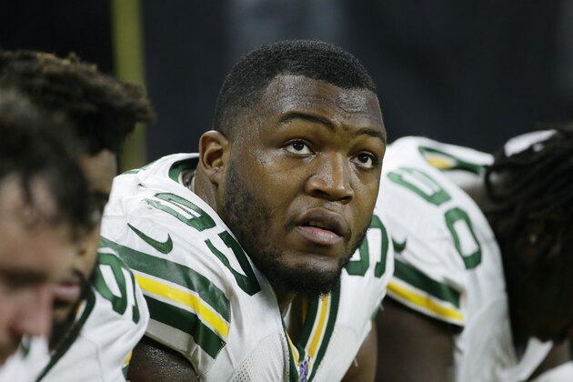 Green Bay Packers nose tackle Kenny Clark sits on the bench during the second half of an NFL football game against the Detroit Lions, Sunday, Dec. 29, 2019, in Detroit. (AP Photo/Duane Burleson)